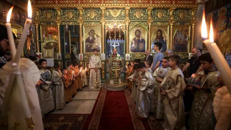 صور - اختفاء مظاهر الفرح خلال احتفالات الكنائس الفلسطينية بأحد الشعانين