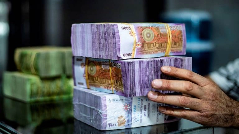 استبدال الليرة السورية عبر 66 شركة وألف منفذ اعتبارا من يناير 2026 
