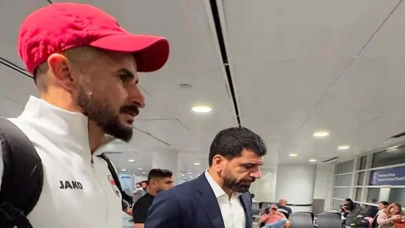 احتجاز وتحقيق.. تفاصيل أزمة أيمن حسين ومصور منتخب العراق في أميركا