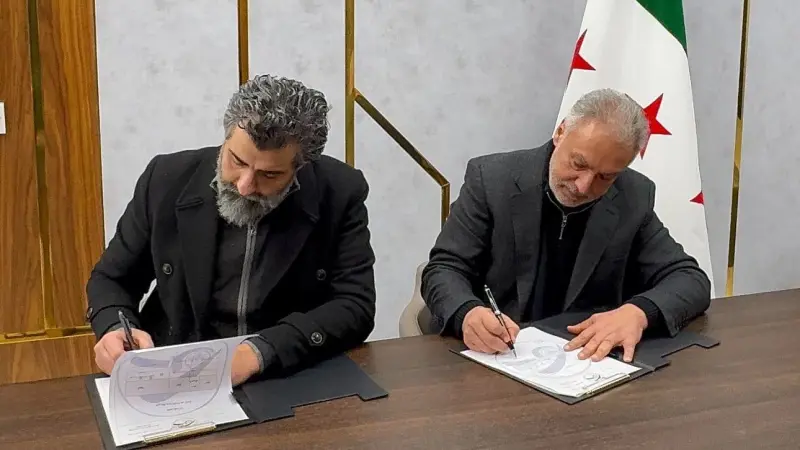 من هو محمد حمشو الذي وقع اتفاقا شاملا مع الحكومة السورية؟